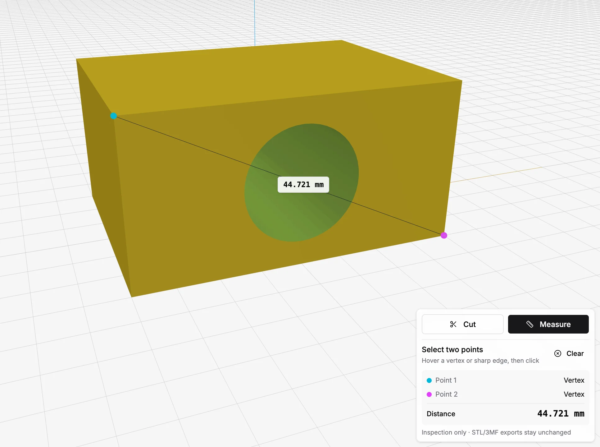 The Measure tool showing a distance of 44.721 mm between two vertices on a model with a cylindrical hole